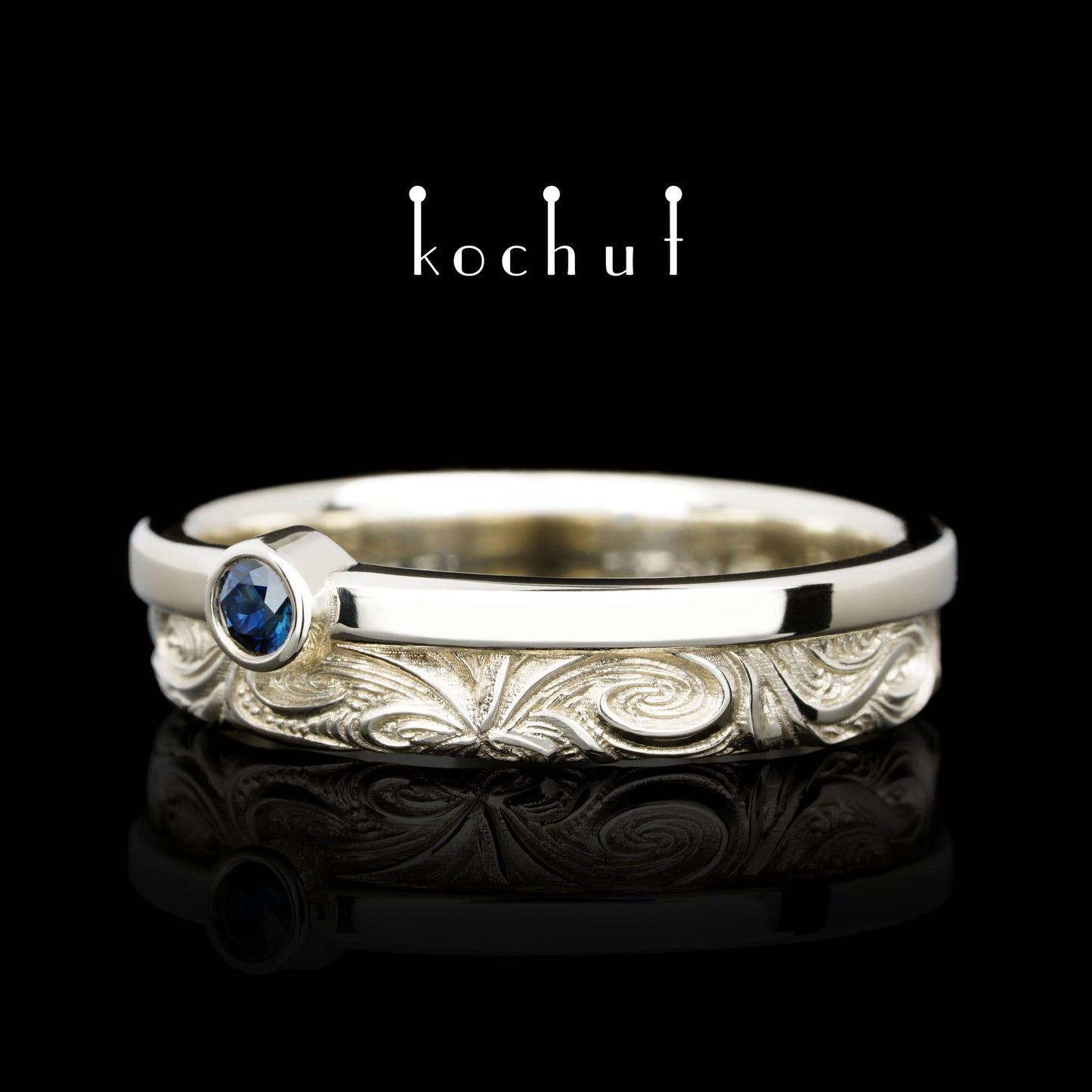 In Freude und Leid: Halbe — Ring aus Weißgold mit Saphir
