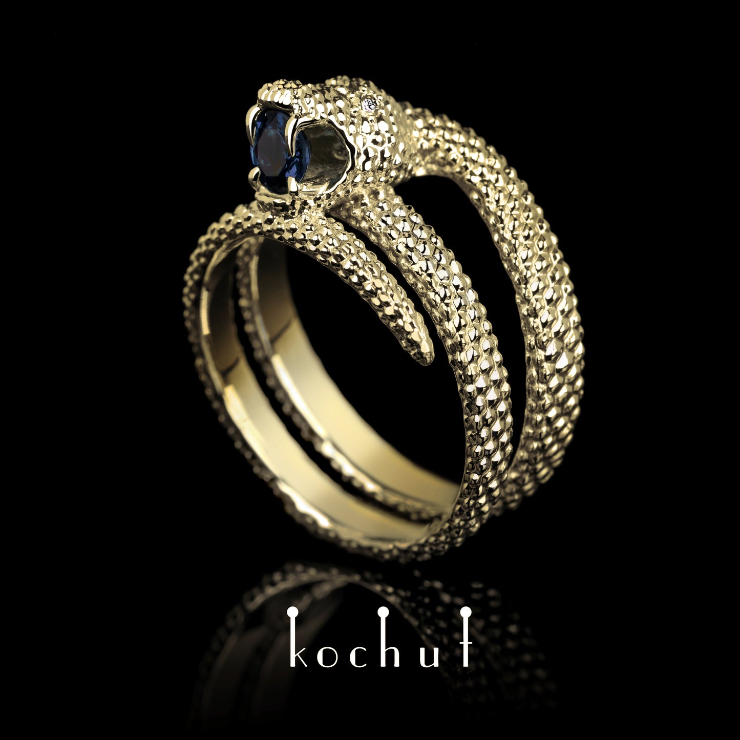 Liebe der Widerspenstigen — Ring aus Gelbgold mit einem blauen Saphir und Diamanten