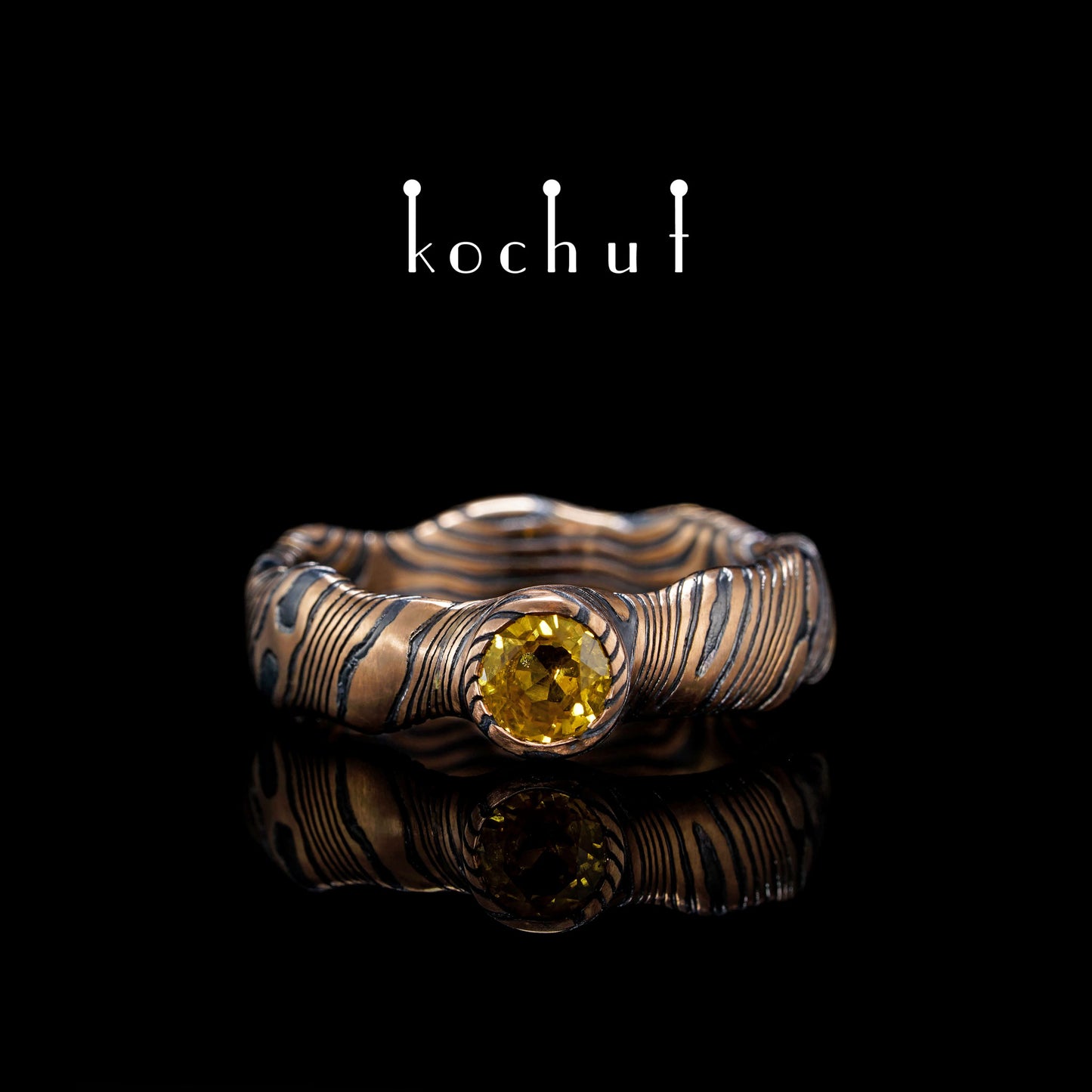 Polarlichter — Mokume-Ring aus geätztem und oxidiertem Silber und Rotgold mit gelbem Saphir