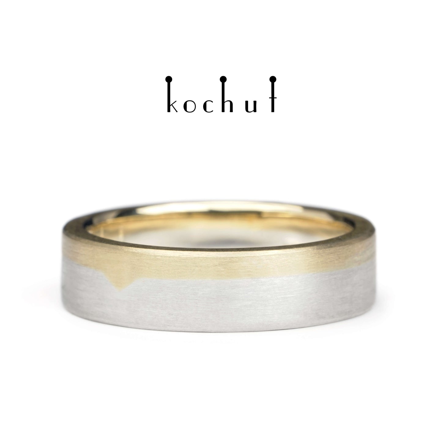 Die letzte Grenze – flach geformter Ehering aus Gelbgold und Sterlingsilber