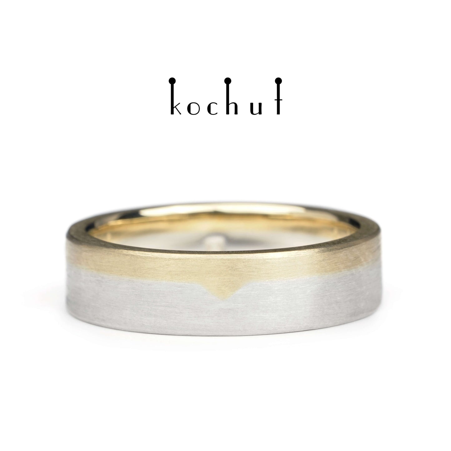Die letzte Grenze – flach geformter Ehering aus Gelbgold und Sterlingsilber