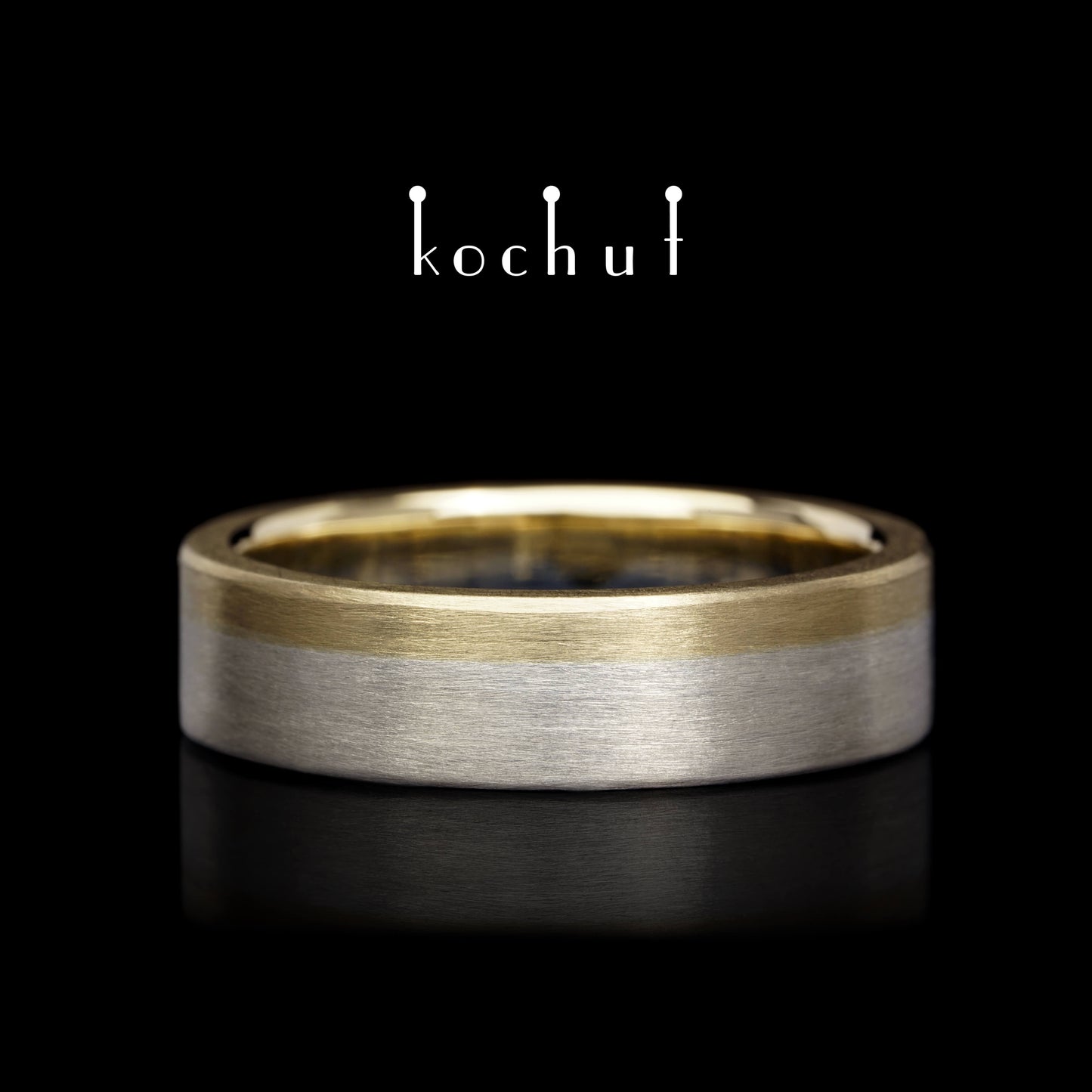 Die letzte Grenze – flach geformter Ehering aus Gelbgold und Sterlingsilber