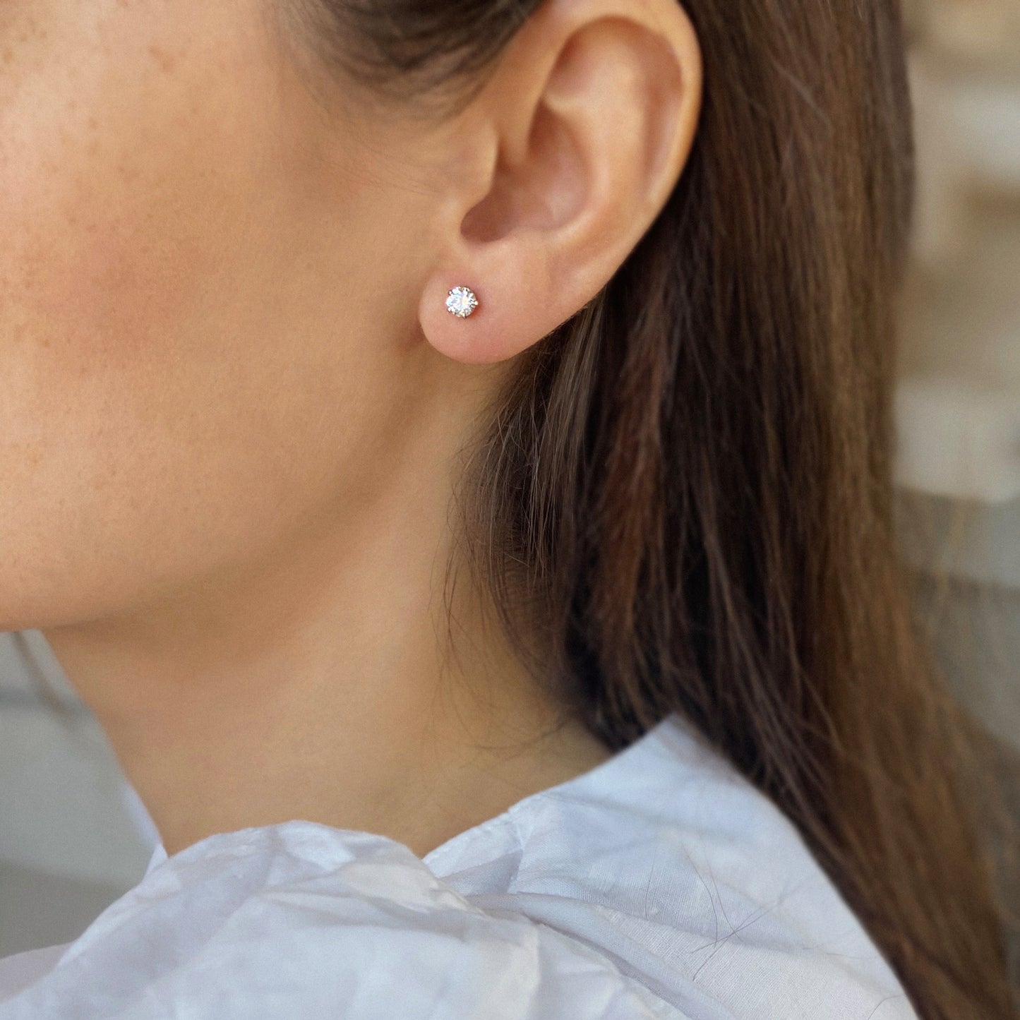 Infinity — Ohrringe aus Palladium-Gold mit Diamanten