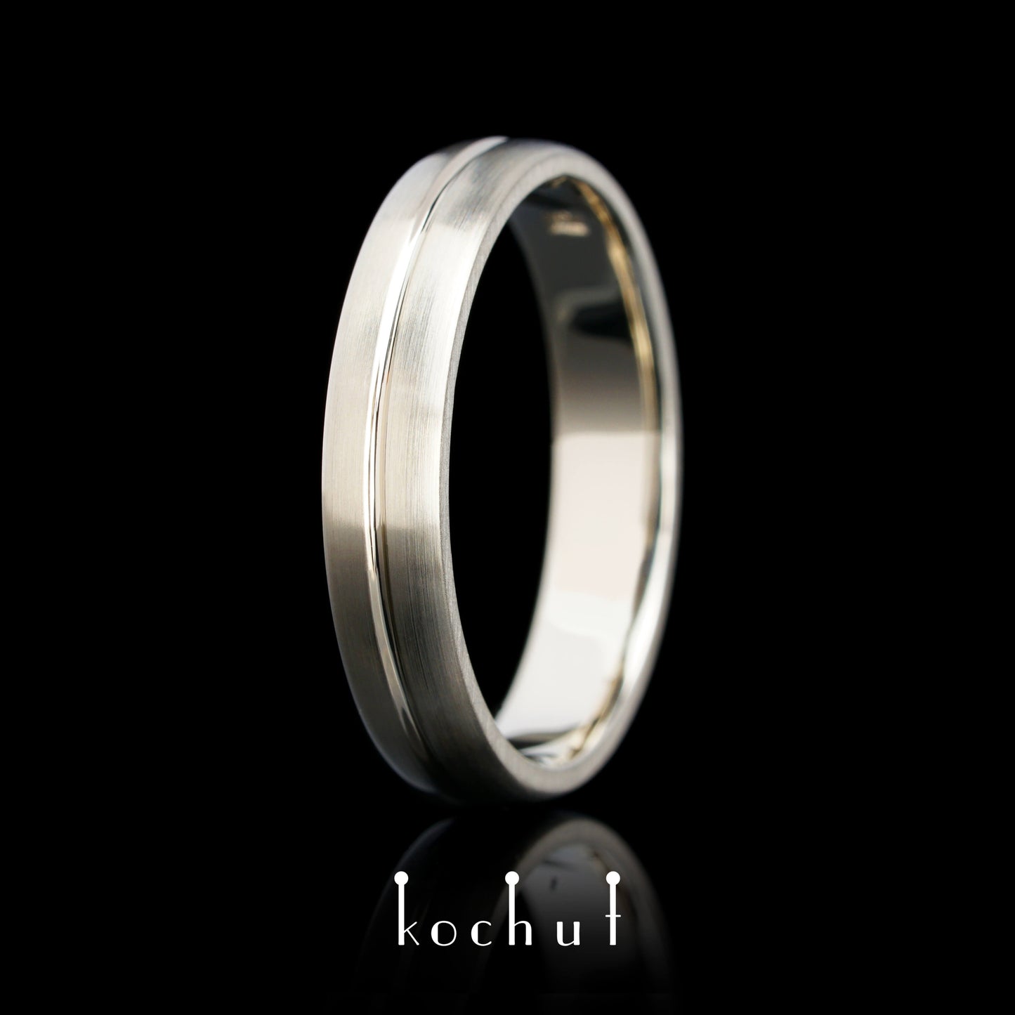 Die Achse der Liebe — Ehering aus Weißgold