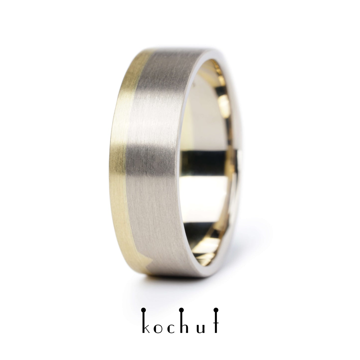 Die letzte Grenze – flach geformter Ehering aus Gelbgold und Palladiumgold