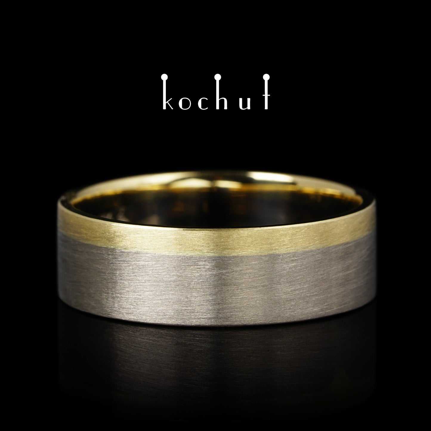 Die letzte Grenze – flach geformter Ehering aus Gelbgold und Palladiumgold