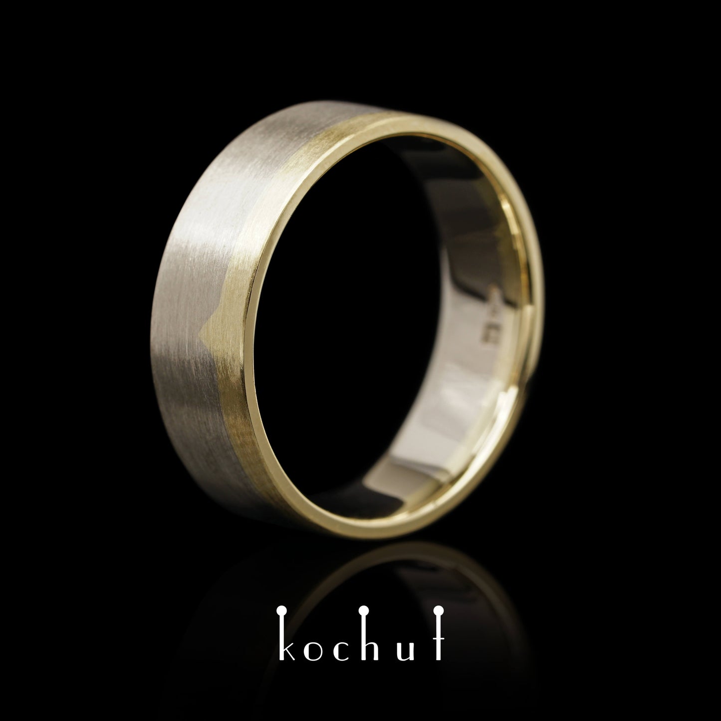 Die letzte Grenze – flach geformter Ehering aus Gelbgold und Palladiumgold