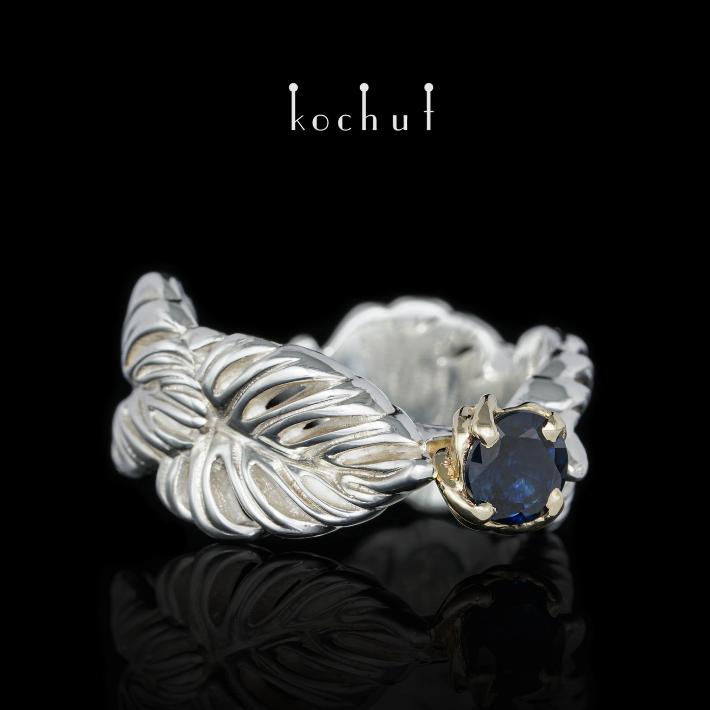 Umarmung der Liane — Ring aus Gelbgold und Silber mit Saphir