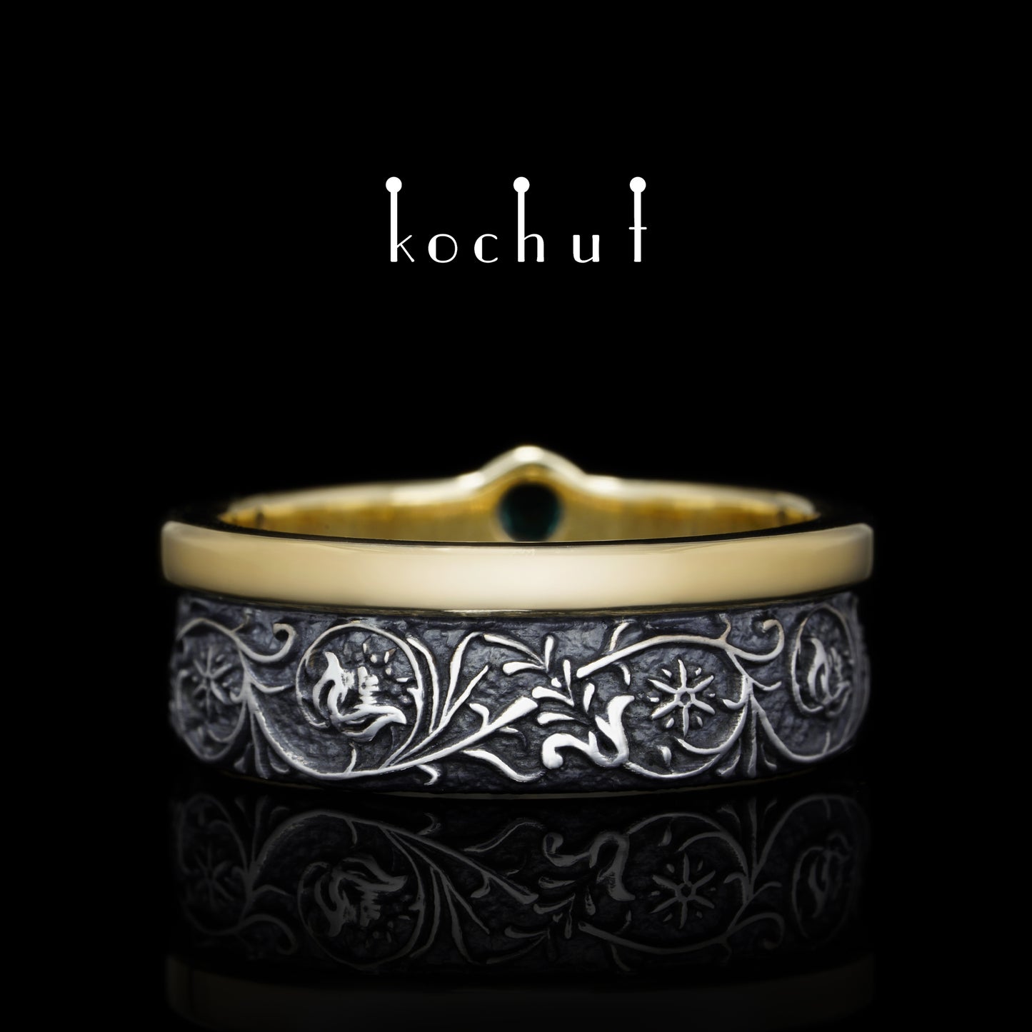 Harmonie der Natur — Ring aus Gelbgold und Silber mit Smaragd, überzogen mit schwarzem Rhodium