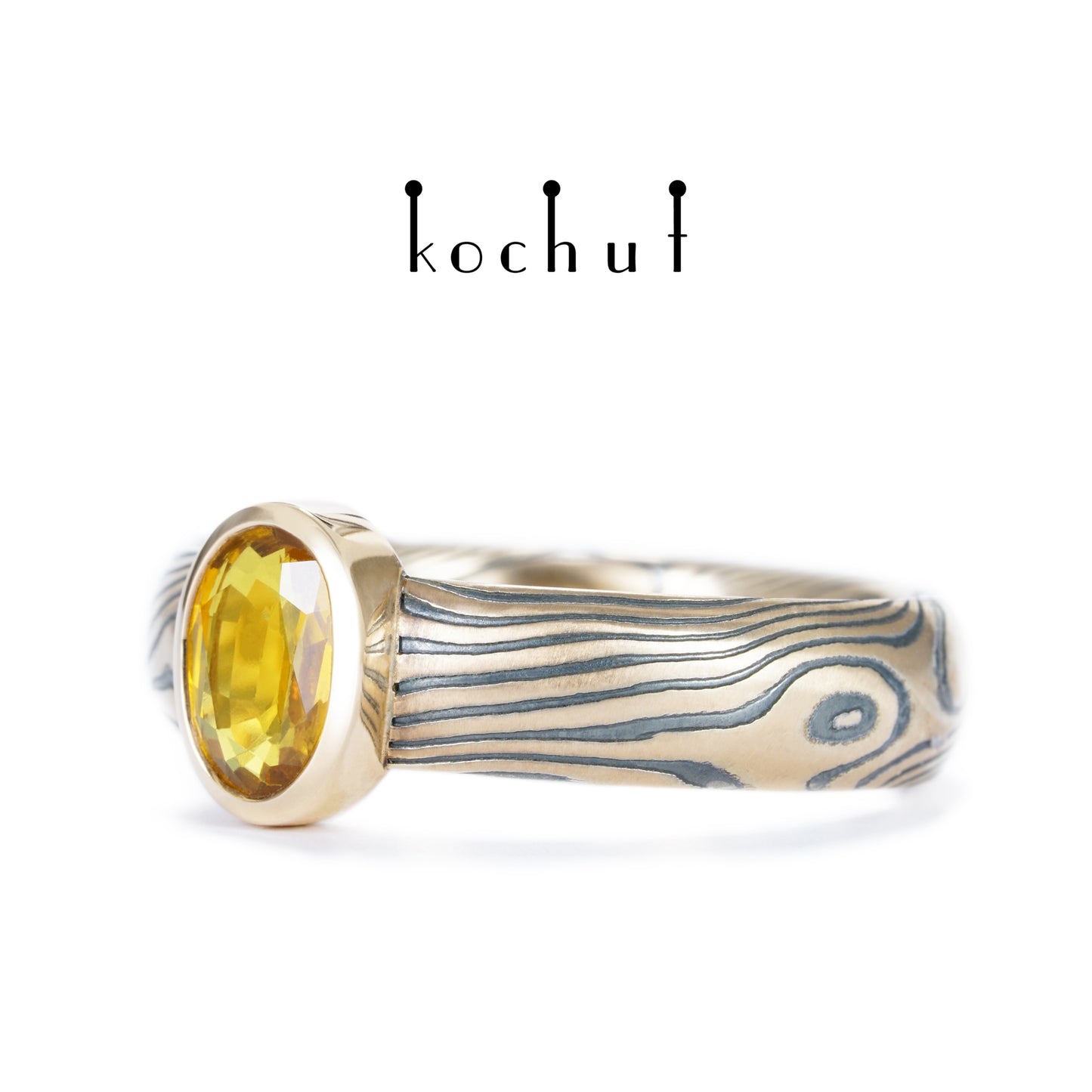 Sophora-Nektar — Mokume-Ring aus Rotgold mit graviertem und oxidiertem Silber sowie gelbem Saphir
