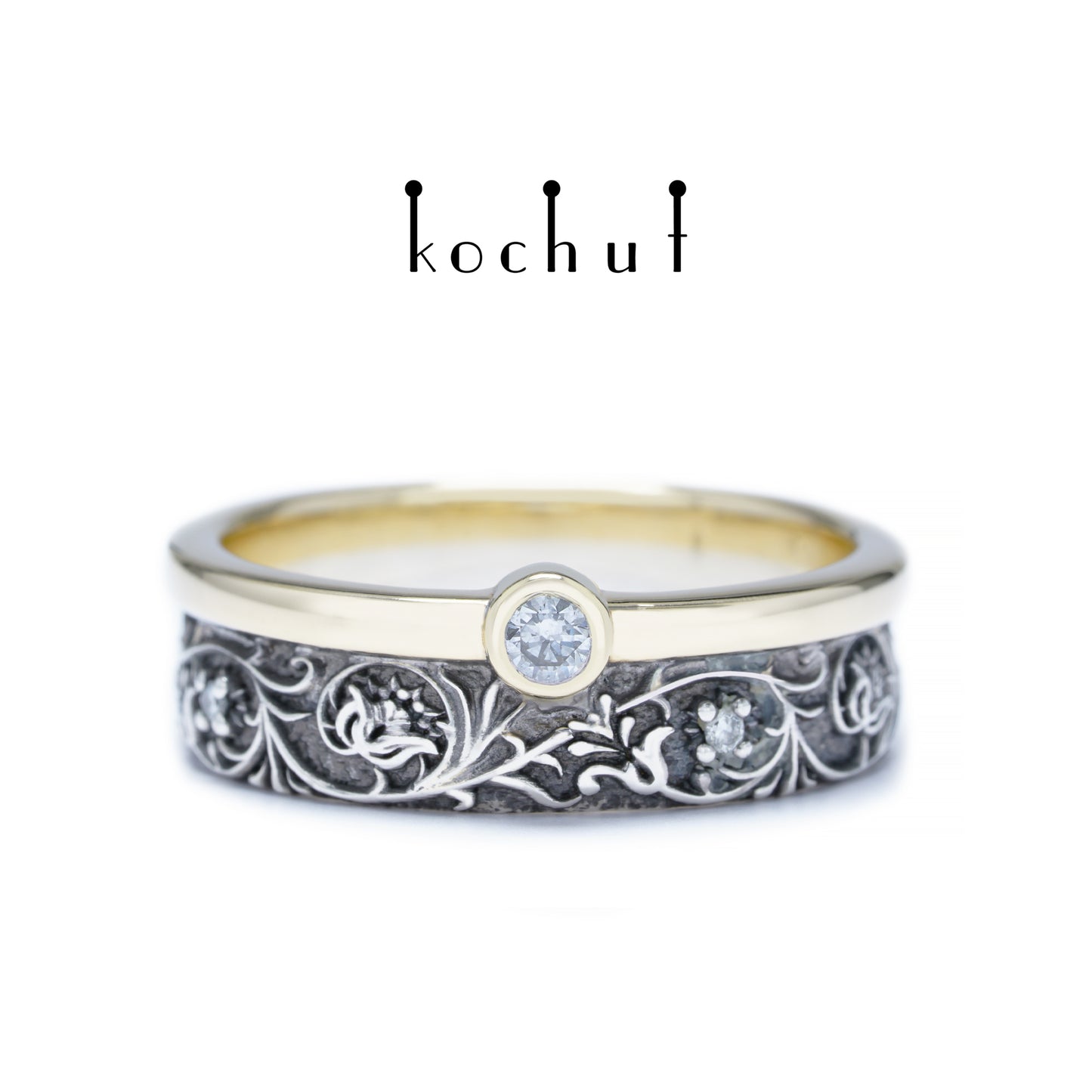 Harmonie der Natur — ein Ring aus Silber und Gelbgold mit Diamanten, überzogen mit schwarzem Rhodium