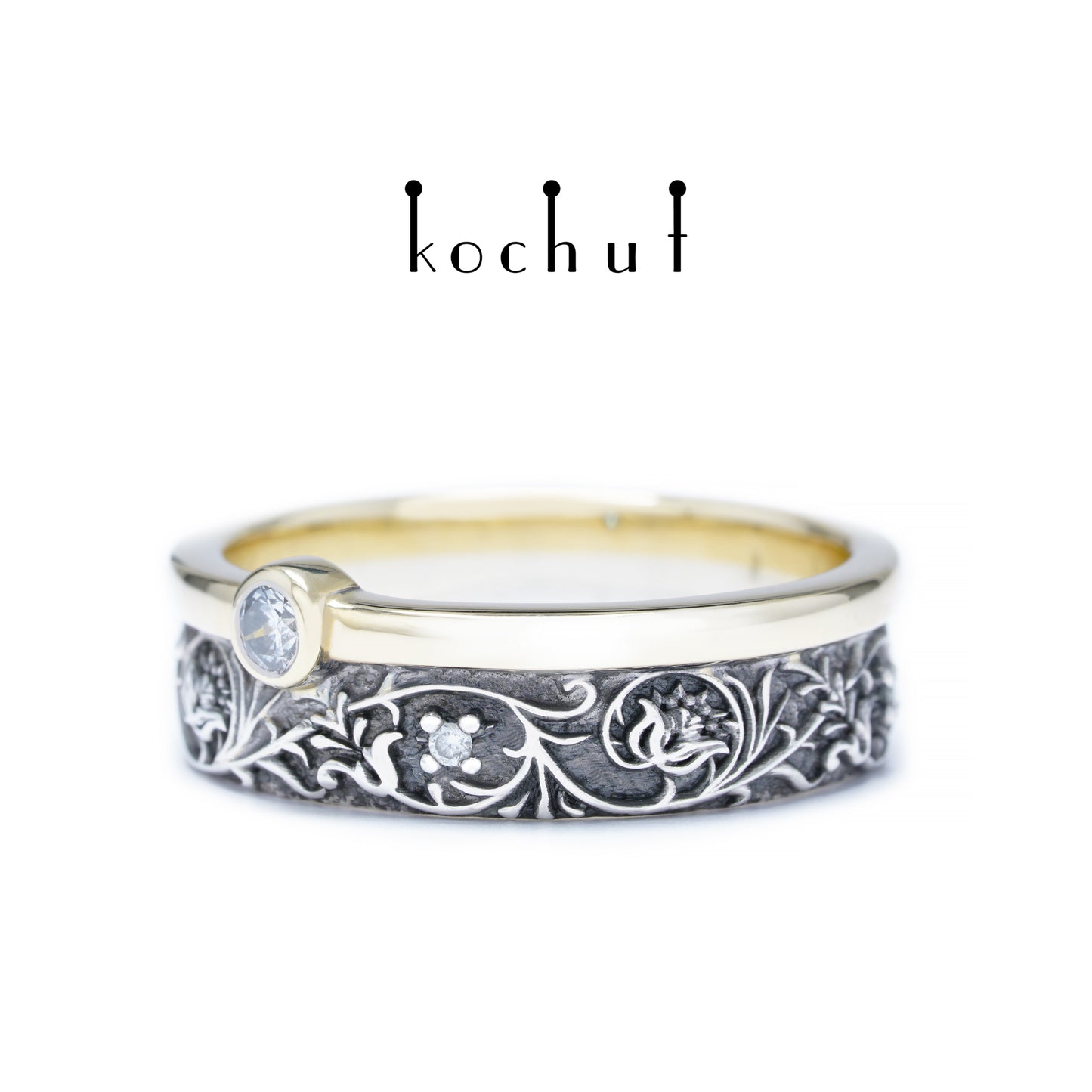 Harmonie der Natur — ein Ring aus Silber und Gelbgold mit Diamanten, überzogen mit schwarzem Rhodium
