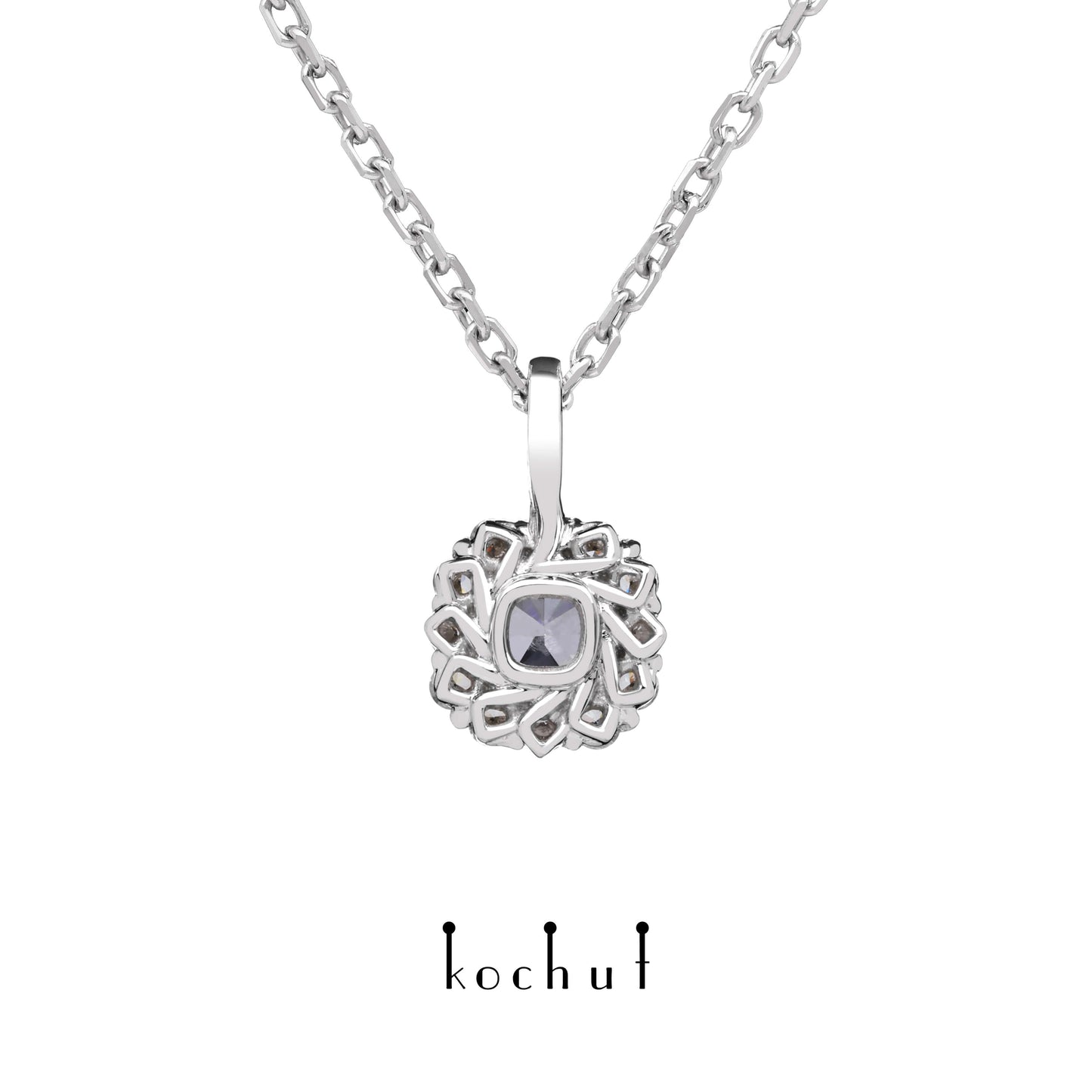 Zeitlos — Anhänger aus Weißgold mit einem blauen Diamanten und einer Streuung weißer Diamanten, beschichtet mit weißem Rhodium