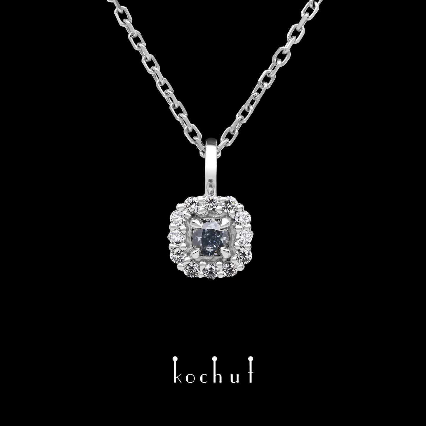 Zeitlos — Anhänger aus Weißgold mit einem blauen Diamanten und einer Streuung weißer Diamanten, beschichtet mit weißem Rhodium