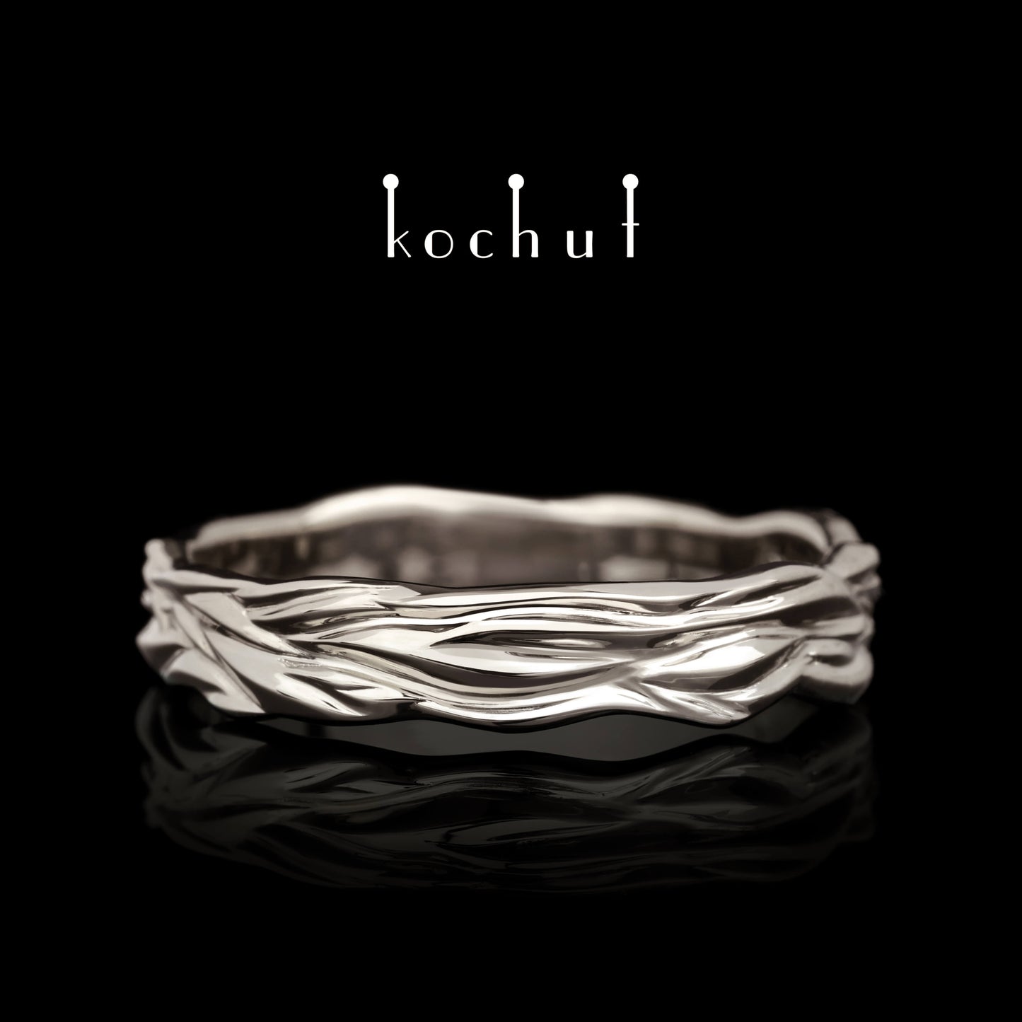 Wellen der Liebe — Ehering aus Palladium-Gold