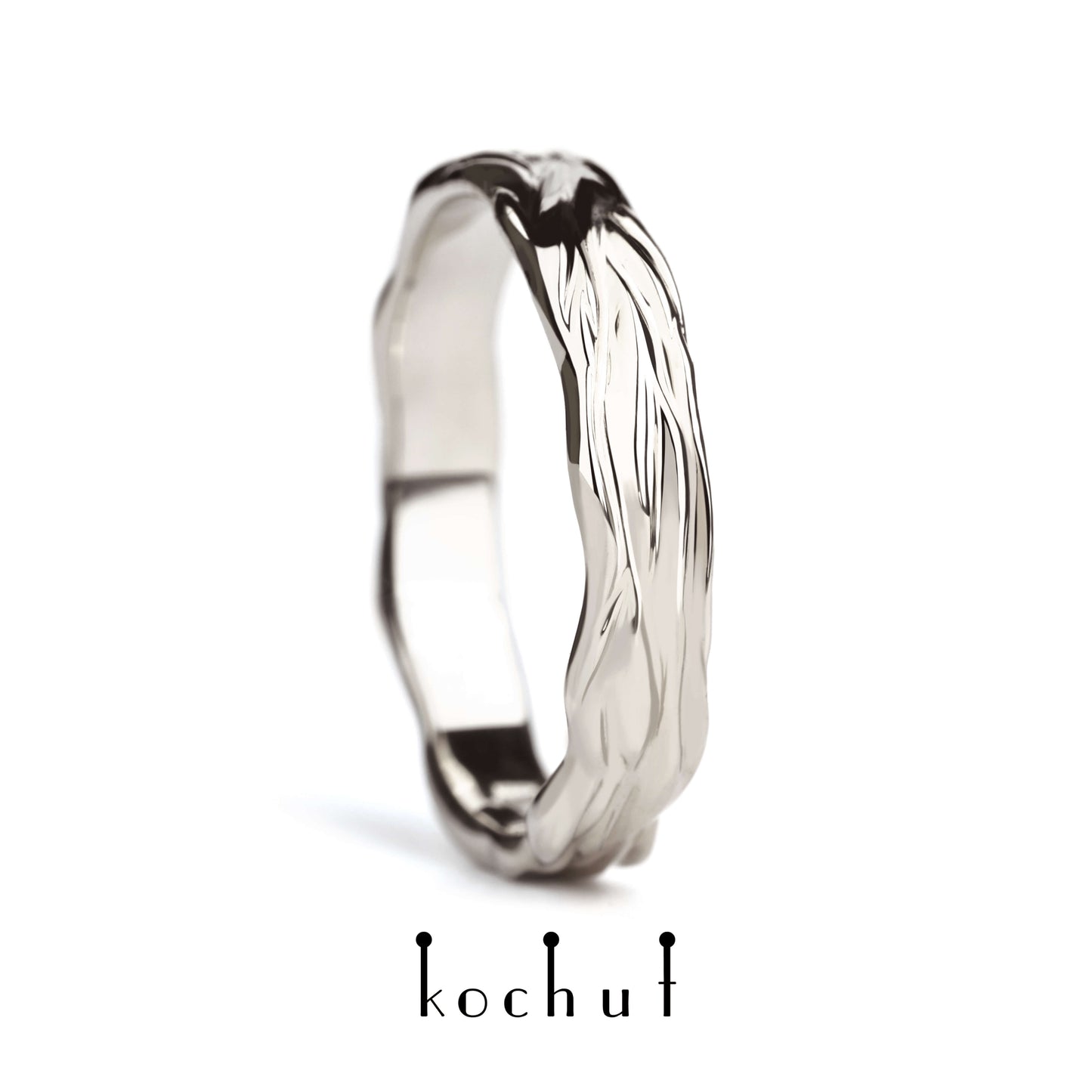 Wellen der Liebe — Ehering aus Palladium-Gold