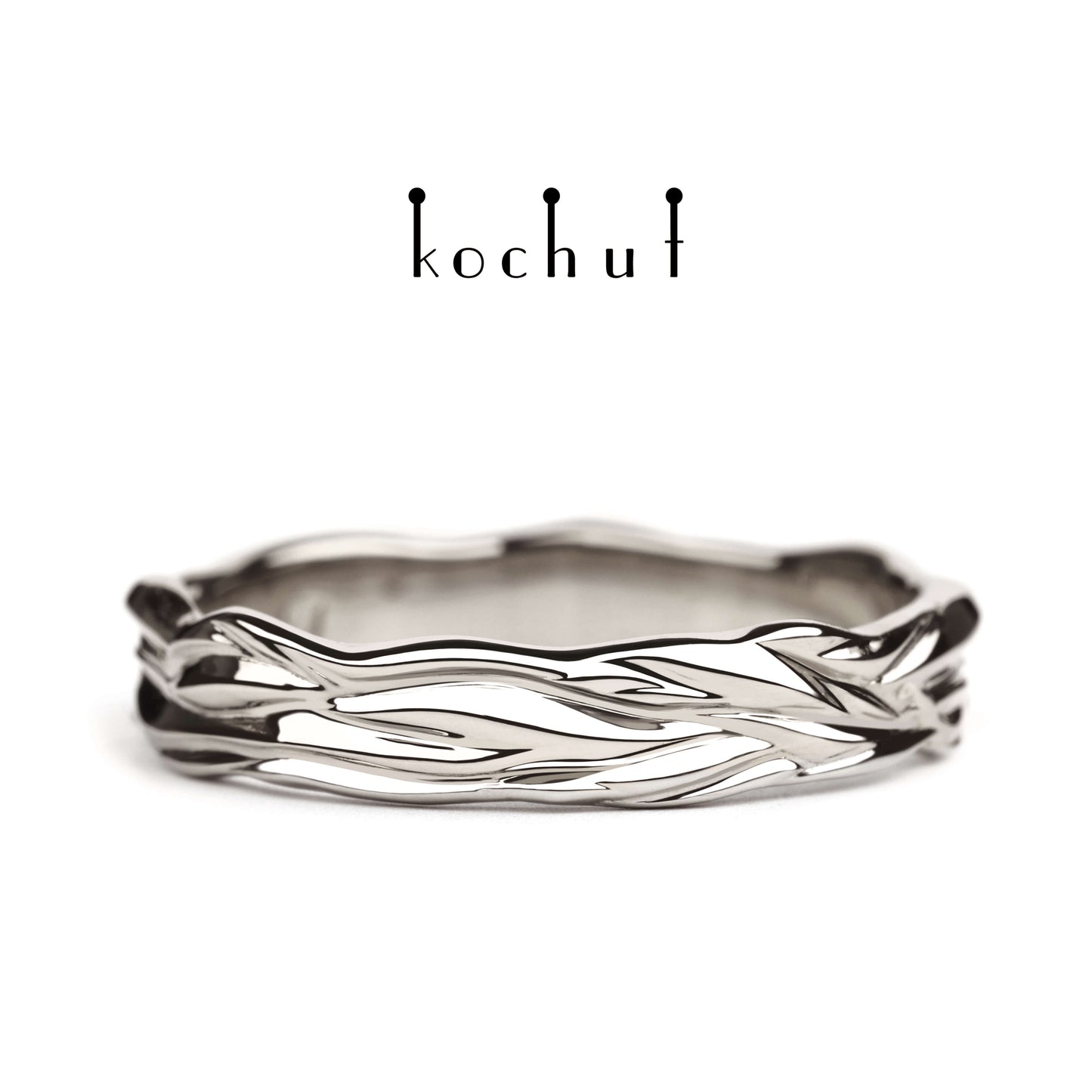 Wellen der Liebe — Ehering aus Palladium-Gold
