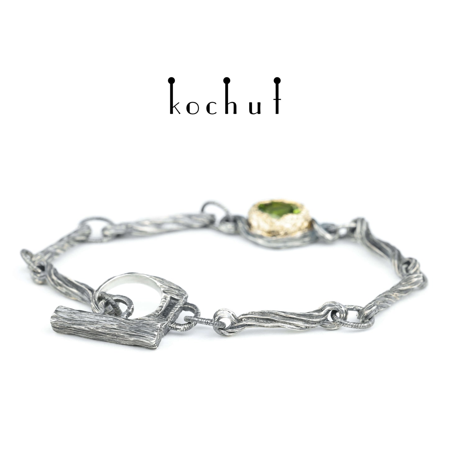 Quelle des Lebens — Armband aus oxidiertem Silber und Gelbgold mit Chrysolith
