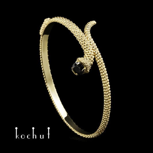 Liebe der Widerspenstigen — Gelbgoldarmband mit Saphir und Diamanten