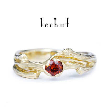Zweig — Ring aus Gelbgold mit rotem Granat