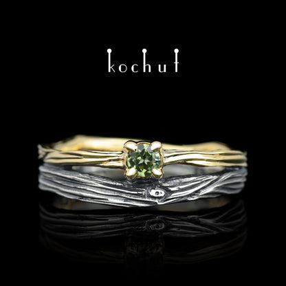 Auge des Waldes — Ehering aus oxidiertem Silber und Gelbgold mit Chrysolith