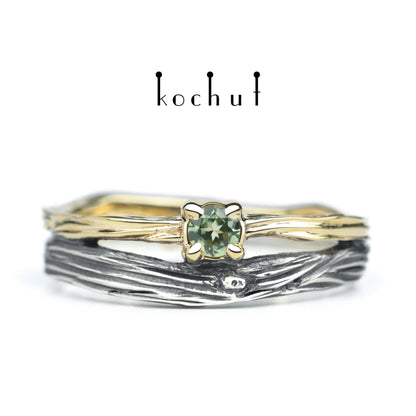 Auge des Waldes — Ehering aus oxidiertem Silber und Gelbgold mit Chrysolith