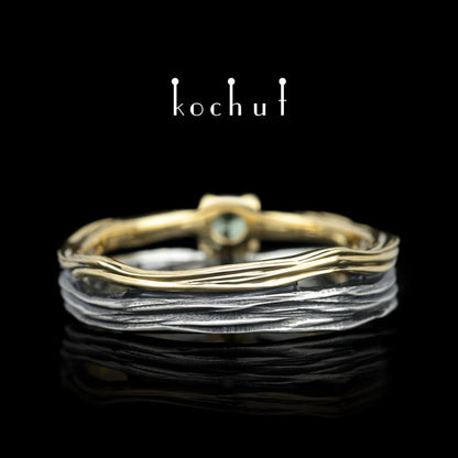 Auge des Waldes — Ehering aus oxidiertem Silber und Gelbgold mit Chrysolith