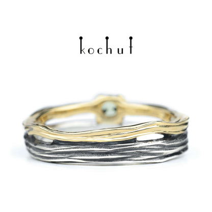 Auge des Waldes — Ehering aus oxidiertem Silber und Gelbgold mit Chrysolith