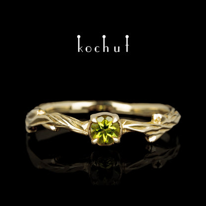 März-Zweig — Ring aus Gelbgold mit Chrysolith
