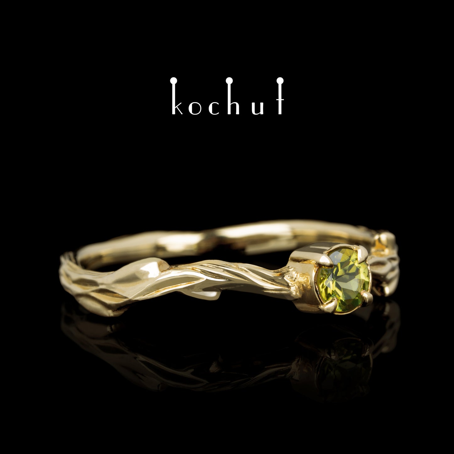 März-Zweig — Ring aus Gelbgold mit Chrysolith