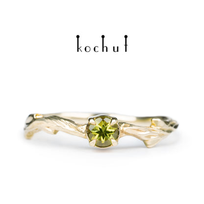 März-Zweig — Ring aus Gelbgold mit Chrysolith