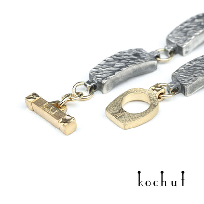 Wellen der Ruhe — Armband aus oxidiertem Silber und Gelbgold