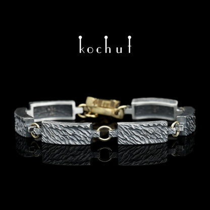 Wellen der Ruhe — Armband aus oxidiertem Silber und Gelbgold