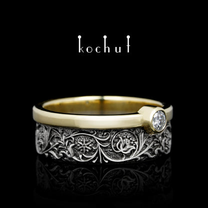Harmonie der Natur — Ehering aus Silber und Gelbgold mit einem Diamanten, beschichtet mit schwarzem Rhodium
