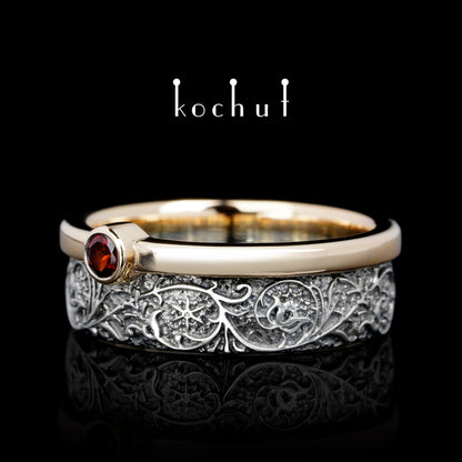 Harmonie der Natur — Ring aus Silber, Rotgold mit Granat, überzogen mit schwarzem Rhodium