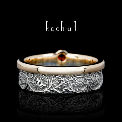 Harmonie der Natur — Ring aus Silber, Rotgold mit Granat, überzogen mit schwarzem Rhodium