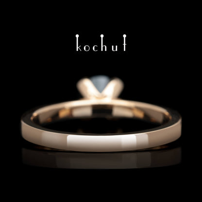 Zärtlichkeit der Gefühle — Ring aus Rotgold mit schwarzem Spinell