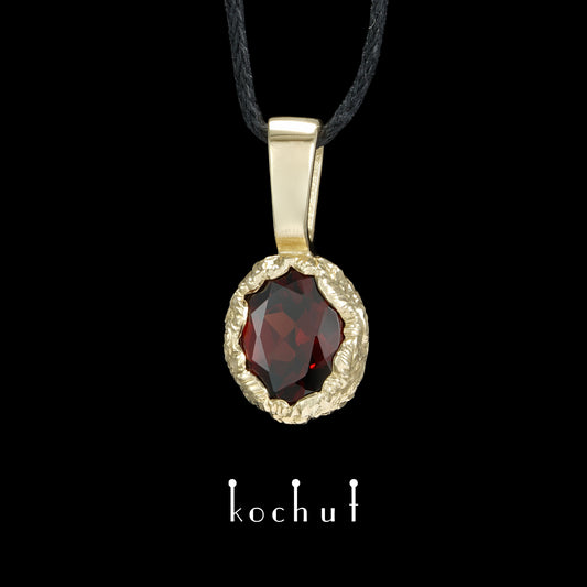 Quelle des Lebens — Anhänger aus Gelbgold mit rotem Granat