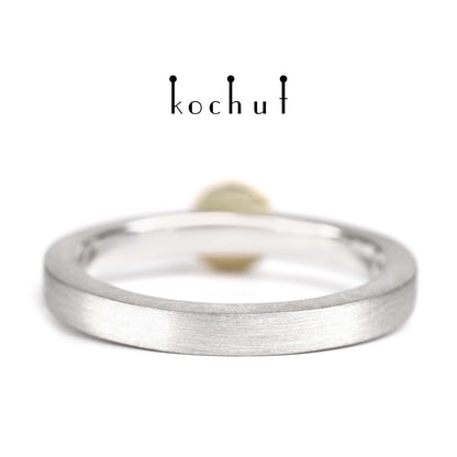 Mars — Ring aus Silber und Gelbgold mit einem Granat