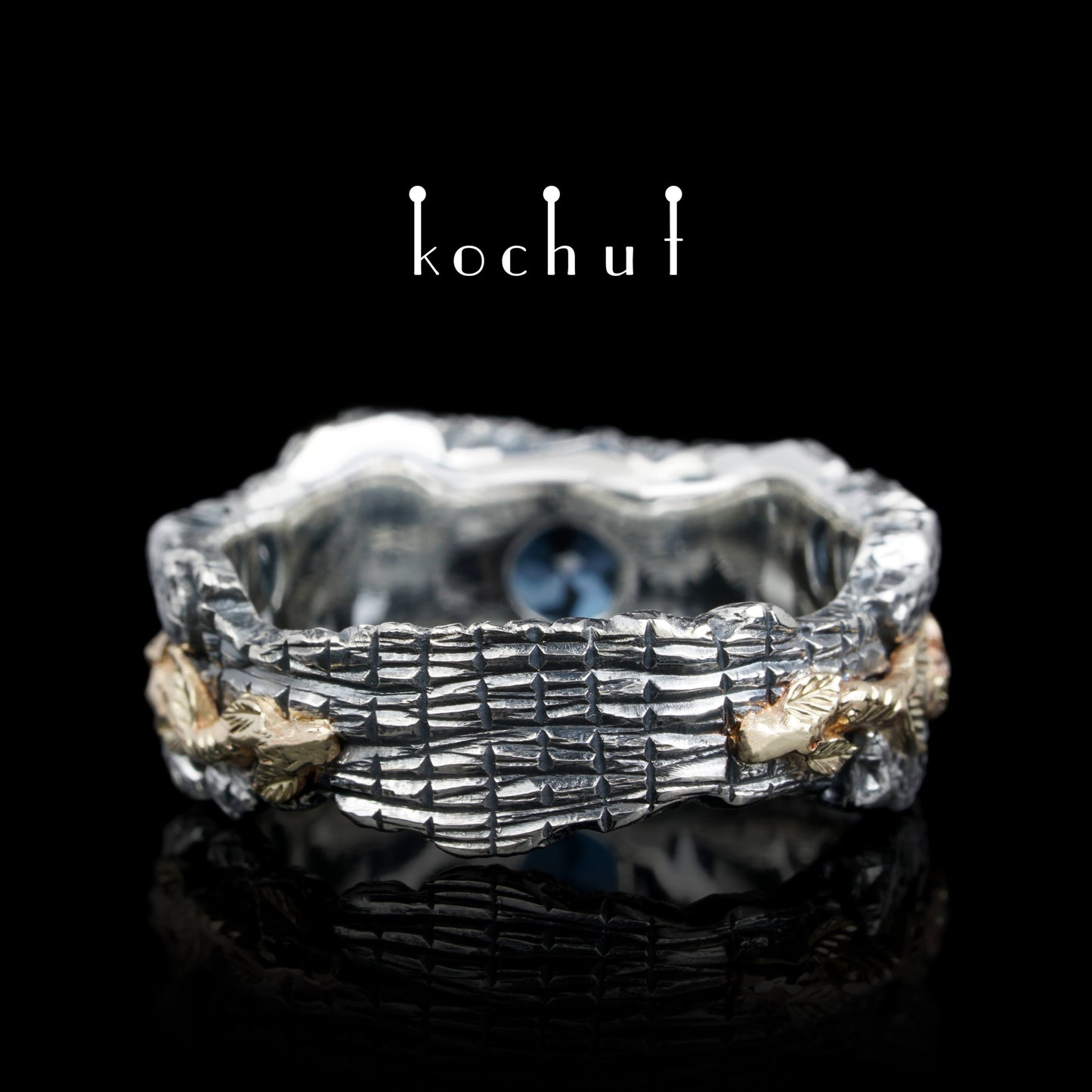 Kraft des Lebens — Ring aus oxidiertem Silber und Gelbgold mit Topas