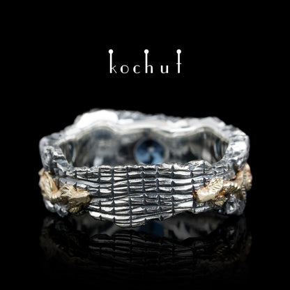 Kraft des Lebens — Ring aus oxidiertem Silber und Gelbgold mit Topas