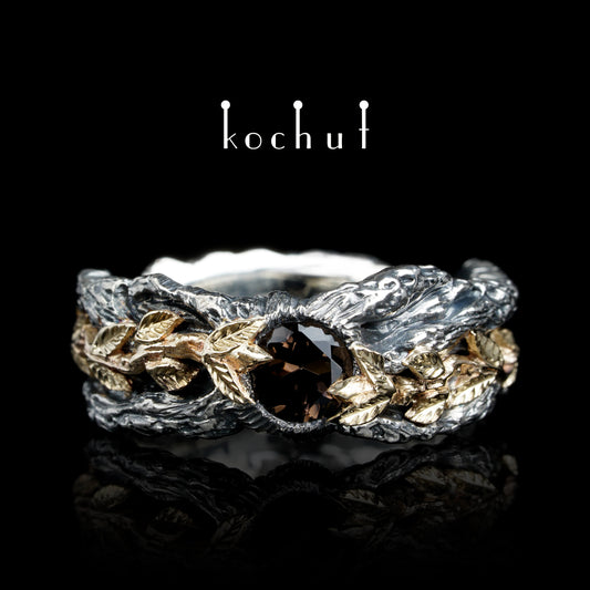Kraft des Lebens — Ring aus oxidiertem Silber und Gelbgold mit Rauchquarz