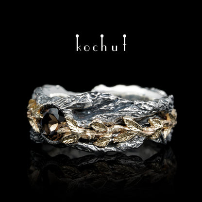Kraft des Lebens — Ring aus oxidiertem Silber und Gelbgold mit Rauchquarz