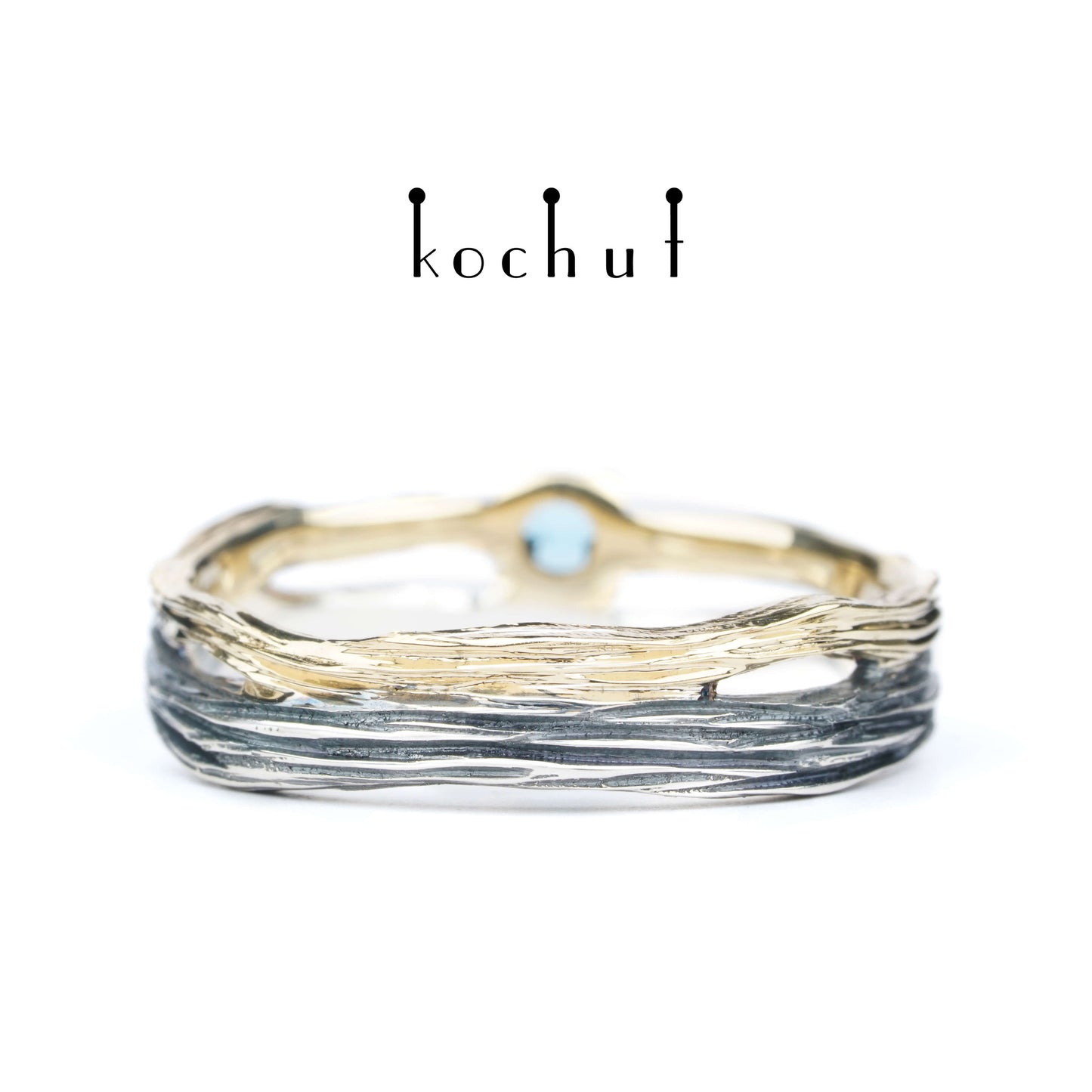 Auge des Waldes — ein Ehering aus oxidiertem Silber und Gelbgold mit Topas
