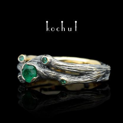 Zweig — Ring aus Gelbgold mit Smaragden, überzogen mit schwarzem Rhodium