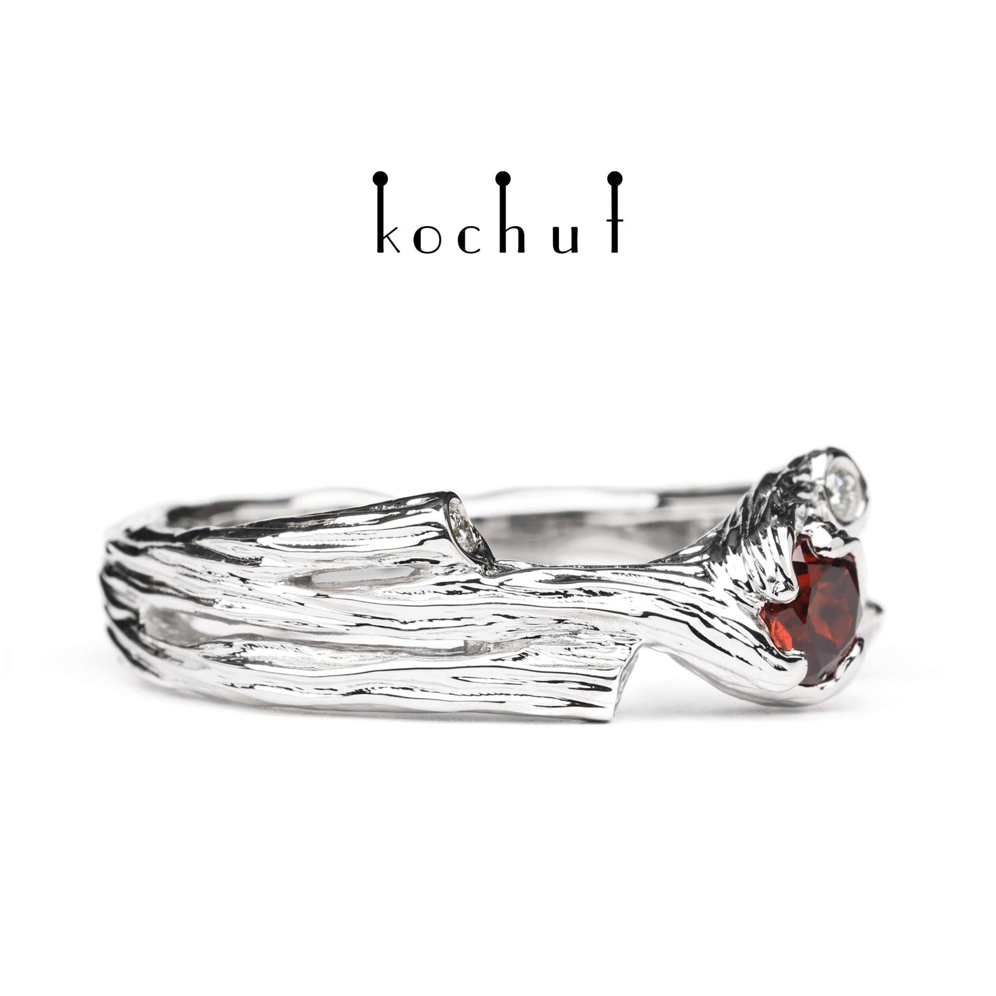 Zweig — Ring aus Weißgold mit Granat und Diamanten, rhodiniert.