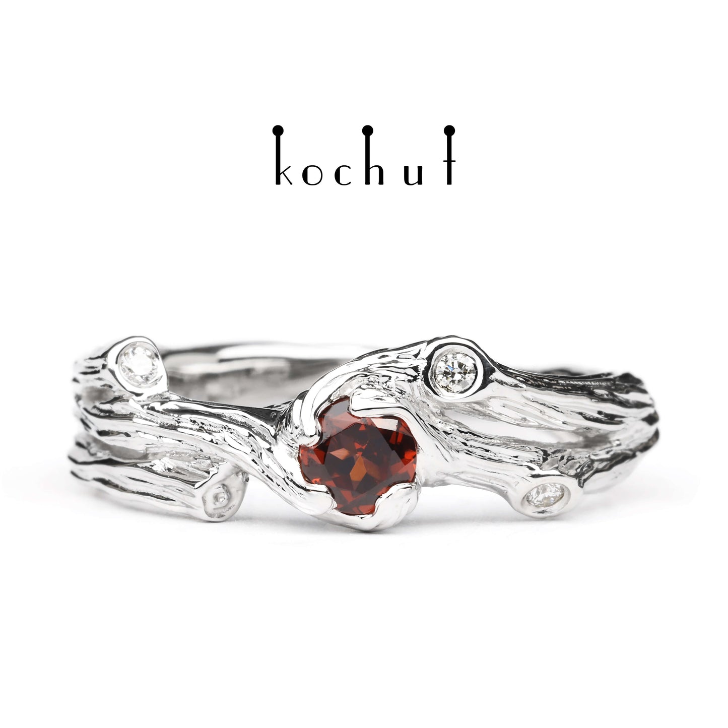 Zweig — Ring aus Weißgold mit Granat und Diamanten, rhodiniert.
