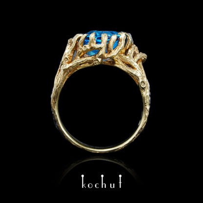 Dominant — ein Ring aus oxidiertem Silber und Gelbgold mit Topas