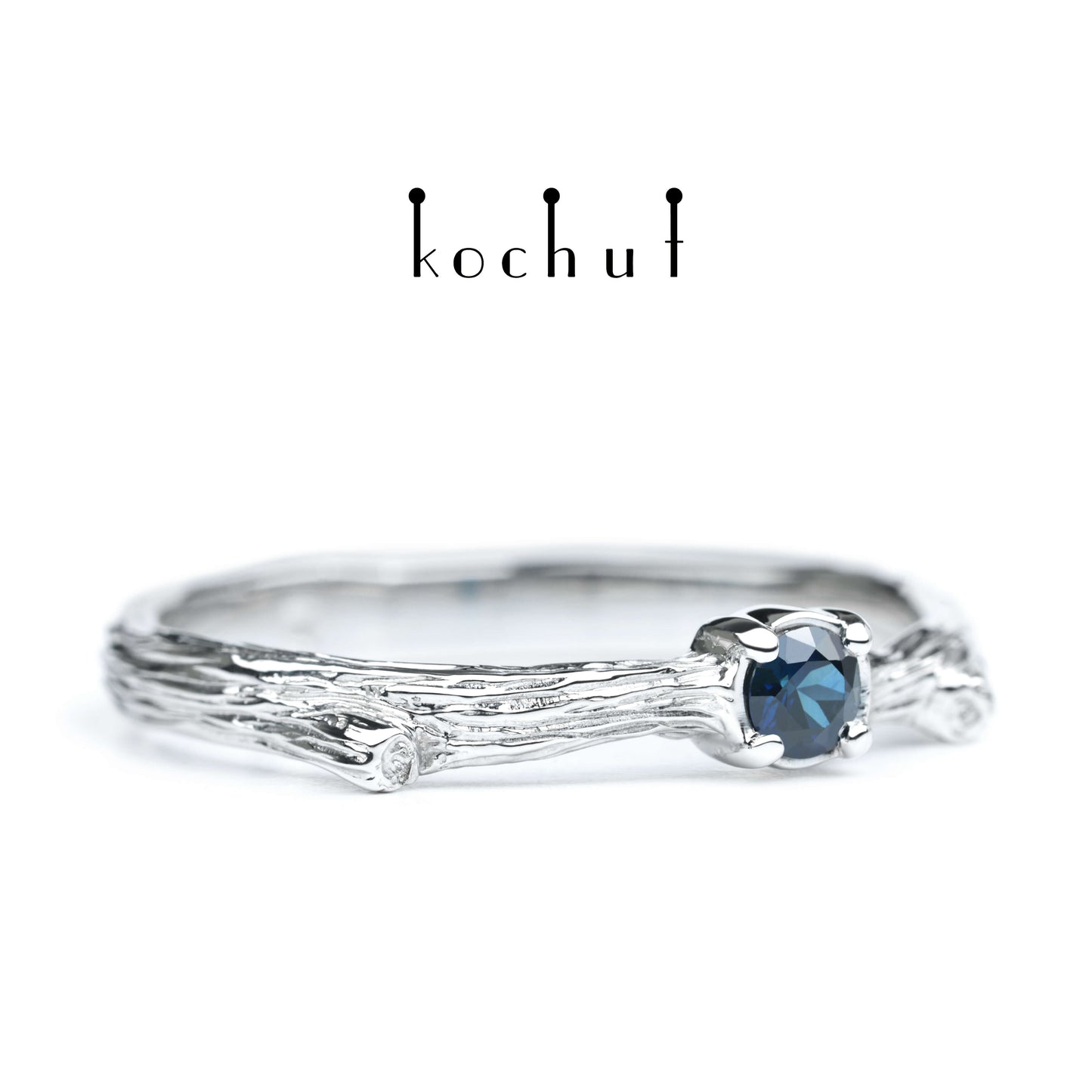 Zartes Zweig — silberner Ring mit einem Saphir, beschichtet mit WeißgoldrhODIUM
