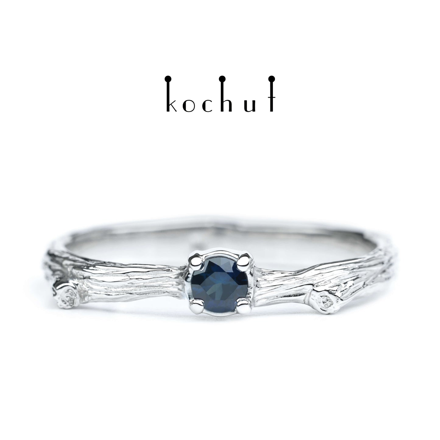 Zartes Zweig — silberner Ring mit einem Saphir, beschichtet mit WeißgoldrhODIUM
